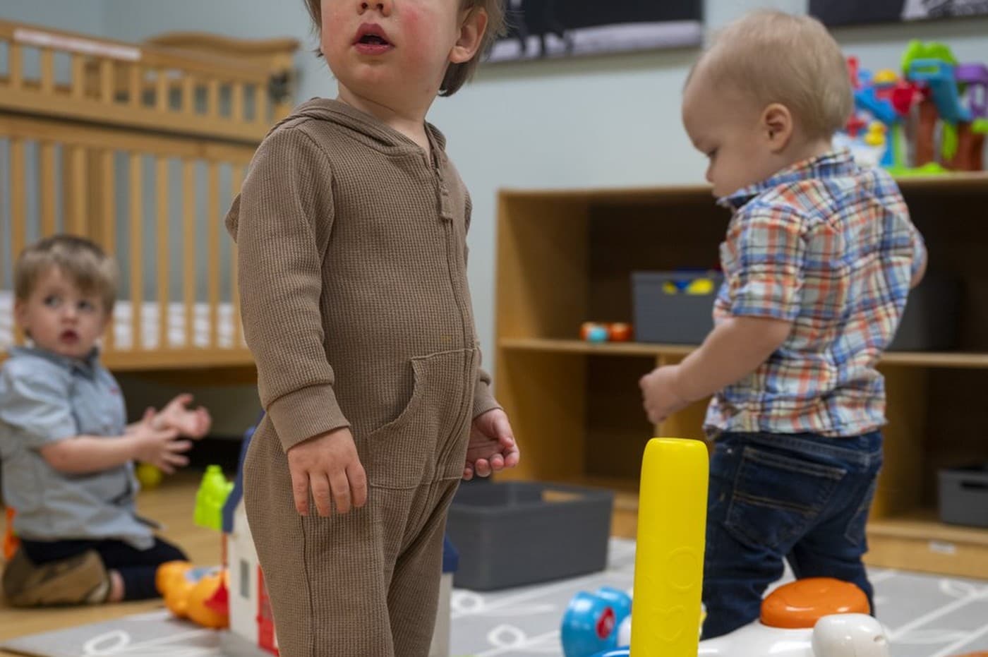 Toddlers playing together in the Brainerd Baptist nursery